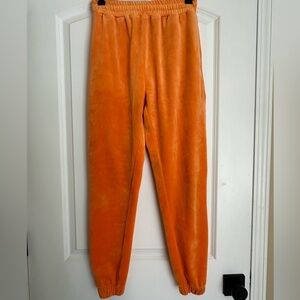 Danielle Guizio ‘Guizio PT2’ Velour Joggers in Orange